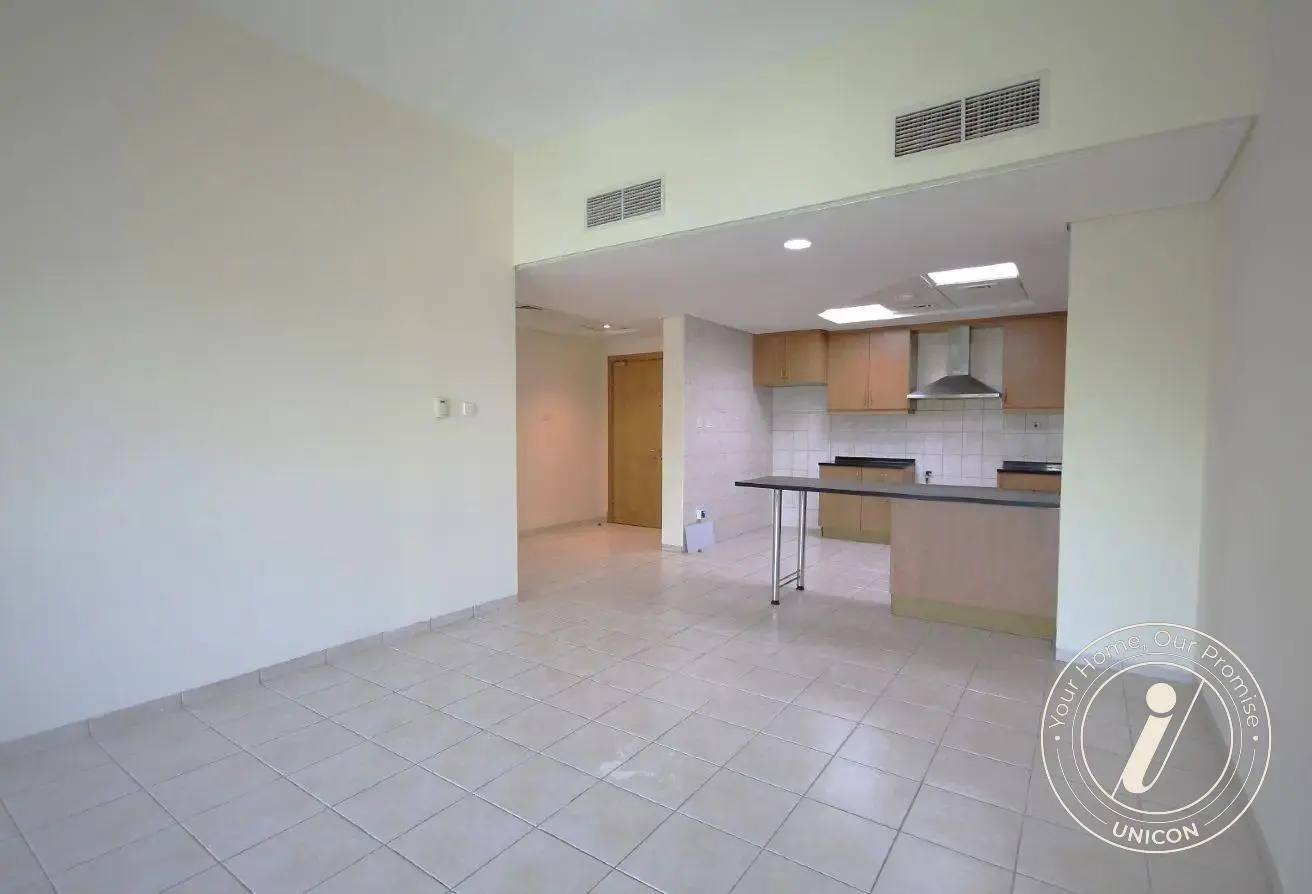 Spacious 2-bedroom living room with courtyard view